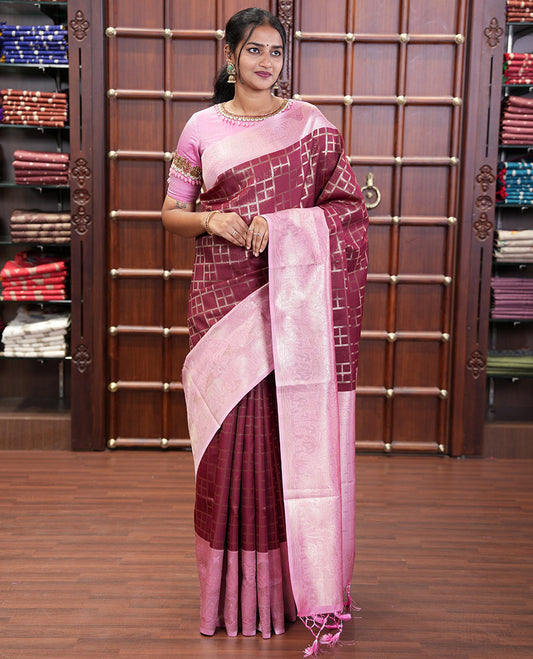 Maroon Elite Soft Silk Saree, Enriched with Checked Design on Its Body, Complemented by a Contrast Border of Jungle-Themed Flora-Fauna Motifs, a Pallu of Checked Design, and Paired with a Contrast Blouse