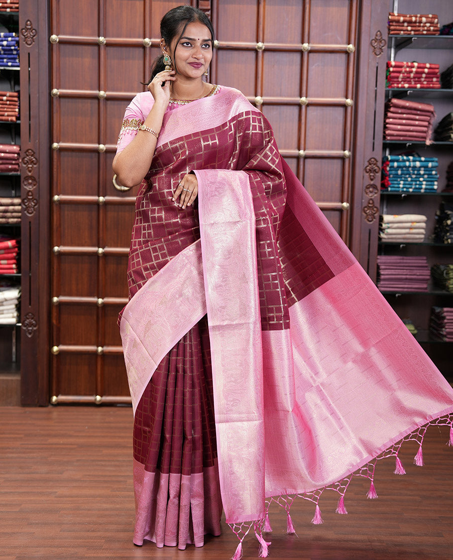 Maroon Elite Soft Silk Saree, Enriched with Checked Design on Its Body, Complemented by a Contrast Border of Jungle-Themed Flora-Fauna Motifs, a Pallu of Checked Design, and Paired with a Contrast Blouse