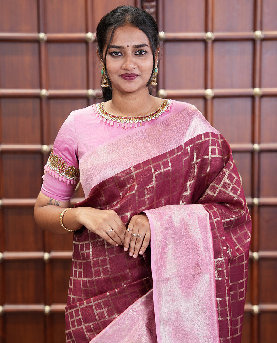 Maroon Elite Soft Silk Saree, Enriched with Checked Design on Its Body, Complemented by a Contrast Border of Jungle-Themed Flora-Fauna Motifs, a Pallu of Checked Design, and Paired with a Contrast Blouse