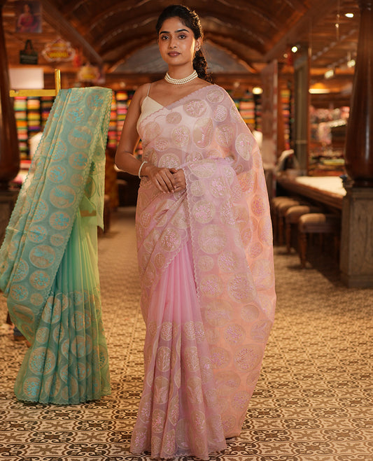 Pearl Pink Organza Saree, Delicately Threaded with Floral Enclosed Circle Motifs Embroidery, Subtle Scallop Border, Delicately Embroidered Pallu, and Paired with a Matching Embroidered Blouse