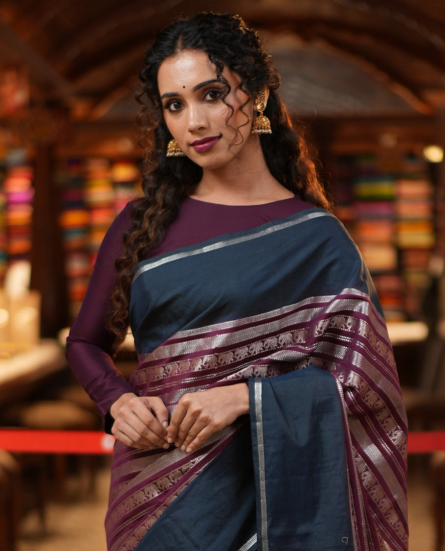 Wine Organza Saree, Richly Zari Detailed with Geometric and Elephant Motifs All Over Its Body, Complemented by Captivating Contrast Zari Border, Zari Decked Up Pallu, and Paired with a Contrast Blouse