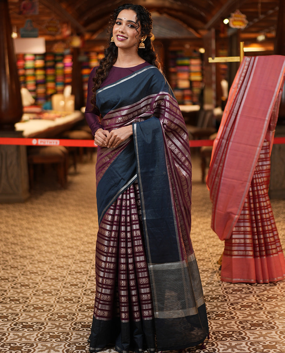 Wine Organza Saree, Richly Zari Detailed with Geometric and Elephant Motifs All Over Its Body, Complemented by Captivating Contrast Zari Border, Zari Decked Up Pallu, and Paired with a Contrast Blouse