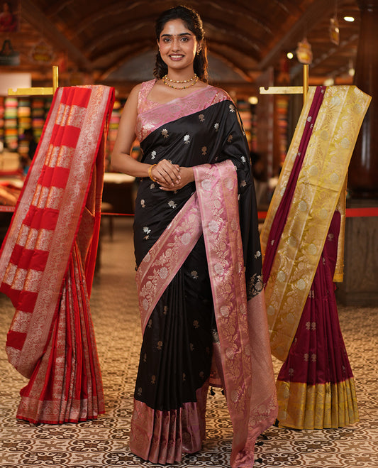 Black Mushuru Silk Saree, Adorned with Zari Buttas All Over Its Body, Complemented by Captivating Contrast Border of Floral Jaal Designs, Grandly Decked Up Pallu and Paired with a Contrast Blouse