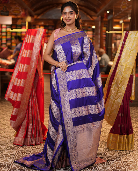 Blue Mushuru Silk Saree, Elegantly Decked Up with Vertically Woven Flora-Fauna Zari Designs On Its Body, Highlighted by Zari Border of Peacock and Deer Motifs, Grand Pallu, and Paired with a Plain Blouse