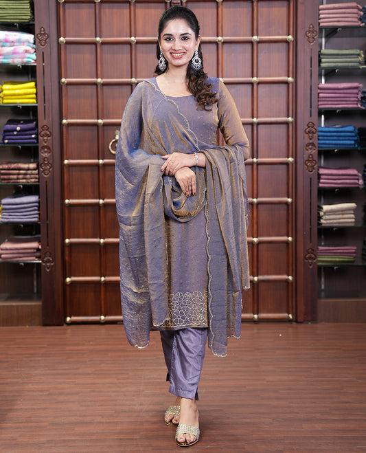 Lavender Moss Organza Material Churidar Set, Gleamed Up with Swarovski Stone Work-Style Floral Top, Comes with a Plain Santoon Bottom, and Is Paired with Swarovski Stone Work Moss Organza Dupatta