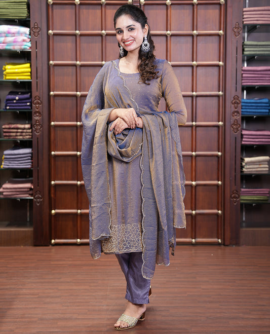 Lavender Moss Organza Material Churidar Set, Gleamed Up with Swarovski Stone Work-Style Floral Top, Comes with a Plain Santoon Bottom, and Is Paired with Swarovski Stone Work Moss Organza Dupatta