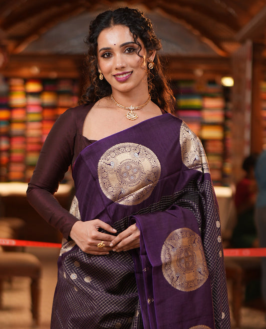 Dark Purple H O-Silk Saree, Beautifully Decked up with Zari Buttas and Zari Checks On Its Body, Accentuated with Contrast Big Chakram Motifs Woven Border, Grand Jaal Design Woven Pallu, and Paired with a Checked Blouse