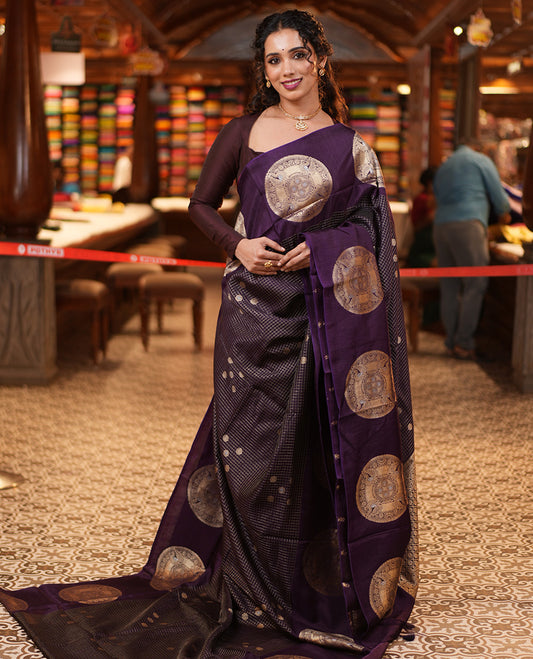 Dark Purple H O-Silk Saree, Beautifully Decked up with Zari Buttas and Zari Checks On Its Body, Accentuated with Contrast Big Chakram Motifs Woven Border, Grand Jaal Design Woven Pallu, and Paired with a Checked Blouse