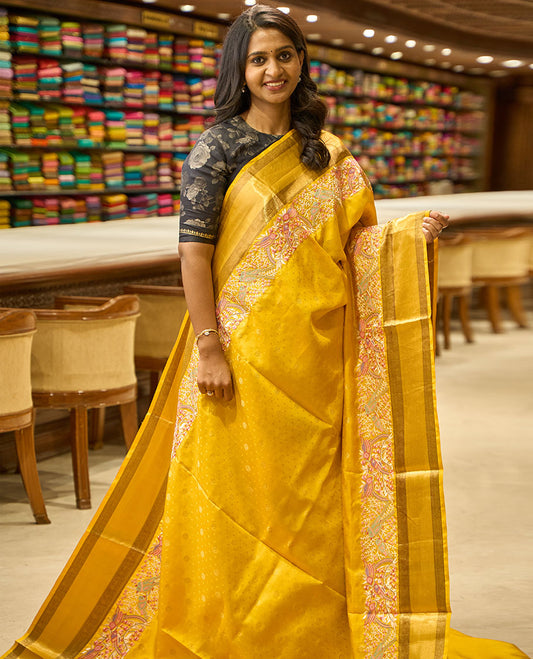 yellow floral embroidery kancheepuram silk saree with self rettai pettu zari design border & checked floral design pallu