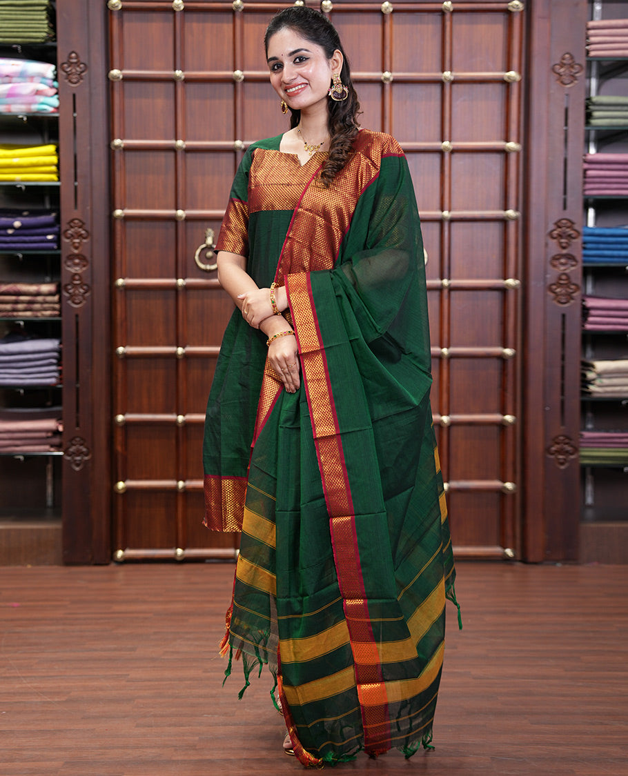 Bottle Green Mercerised Cotton Material Churidar Set, Subtly Made with Plain and Traditional Ara Maadam Bordered Top, Comes with a Plain Mercerised Cotton Bottom, and Is Paired with a Mercerised Cotton Ara Maadam Woven Dupatta