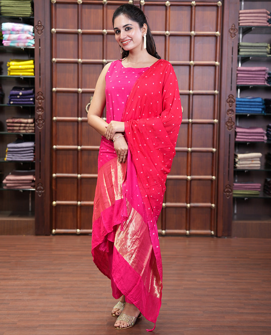 Pink and Red Semi-Silk Material Churidar Set, Prettified with Bandhani Dots Print, Comes with a Plain Santoon Bottom, and Paired with a Double-Colored Dupatta of Bandhani Dots Print
