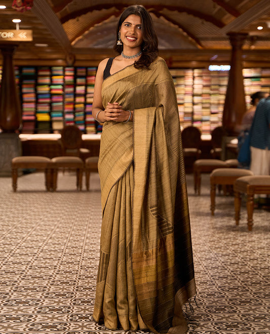 Light brown abstract design tussar silk saree with contrast plain border & striped pallu