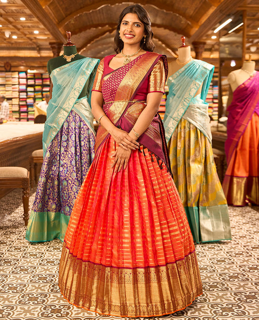 Orange striped readymade silk half saree with contrast intricate zari design border, floral design blouse & floral design dhavani