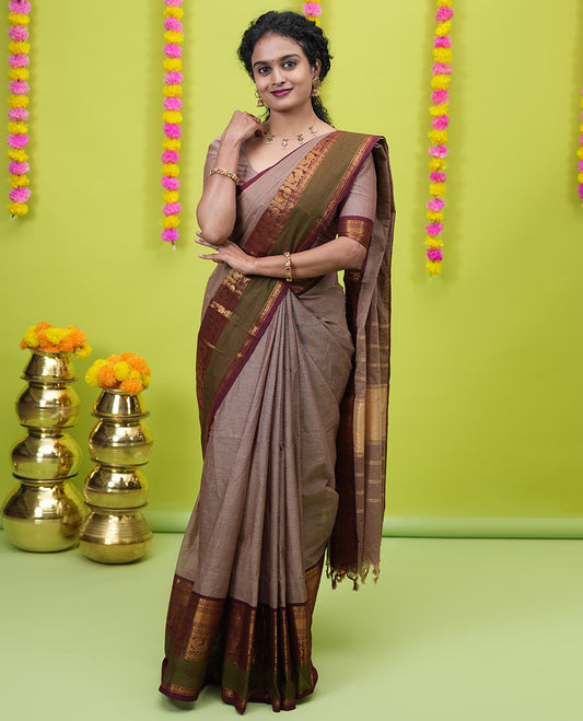 Brown plain chettinad cotton saree, contrast traditional zari rettai pettu border, striped pallu, and a matching blouse