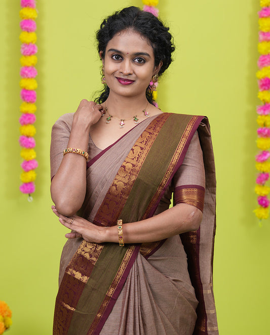 Brown plain chettinad cotton saree, contrast traditional zari rettai pettu border, striped pallu, and a matching blouse