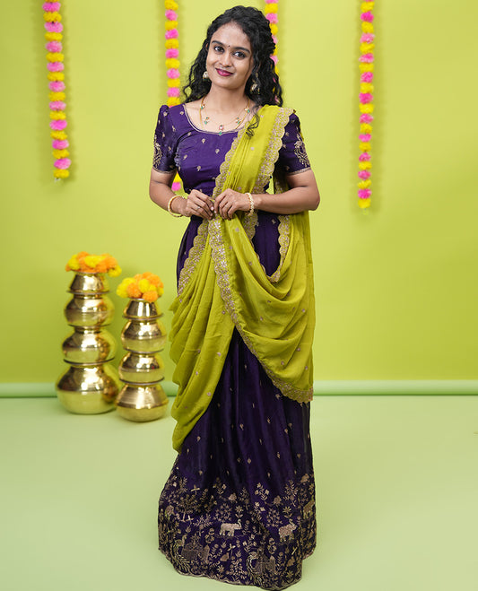 Violet half-saree, floral and bird motifs embroidered velvet organza top, matching embroidered blouse, and contrast scallop embroidered syska georgette dhavani