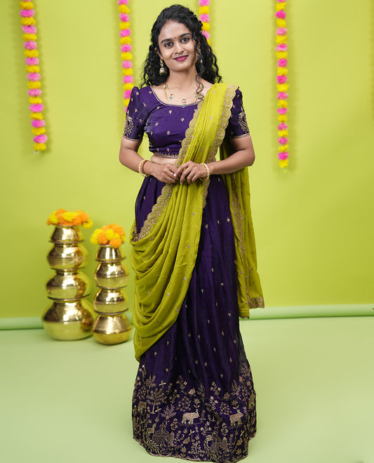 Violet half-saree, floral and bird motifs embroidered velvet organza top, matching embroidered blouse, and contrast scallop embroidered syska georgette dhavani