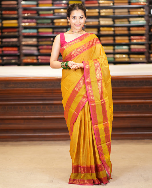 Lemon Yellow Plain Chettinad Cotton Saree, a Contrast Traditional Thread Rettai Pettu Border, Striped Pallu, a Matching Blouse