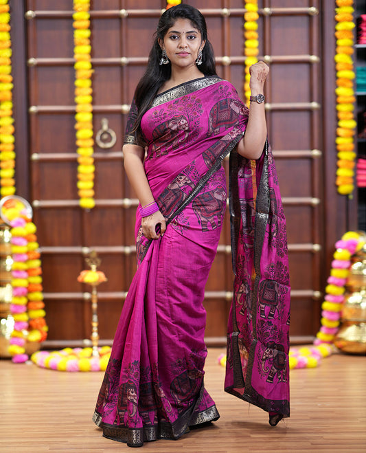 Pink plain muslin cotton saree, contrast wedding-theme of floral and elephant motifs print, printed pallu, and a contrast buttas and zari bordered blouse