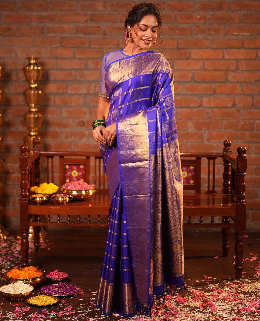 M.s Blue Vasundhara Silk Saree Features Zari Butta Enclosed Checks, a Zari Border of Mayil Kann and Kodi Visiry, Jaal Pallu, and Comes with a Matching Blouse