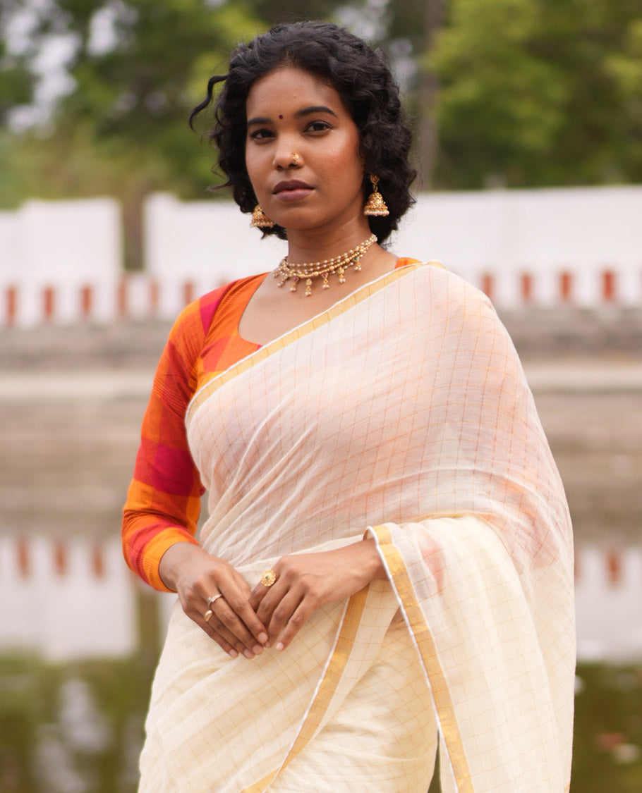 Cream Khadi Mul Cotton Saree, Subtly Sparkled With Zari Checks, a Zari Piping Border and No Blouse