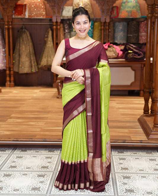 Elaichi Green Assam Silk Saree, Embellished with Horizontal Zari Stripes All Over Its Body, Complemented by a Contrast Traditional Zari Design Rettai Pettu Border, Grand Zari Striped Pallu, and Paired with a Contrast Blouse