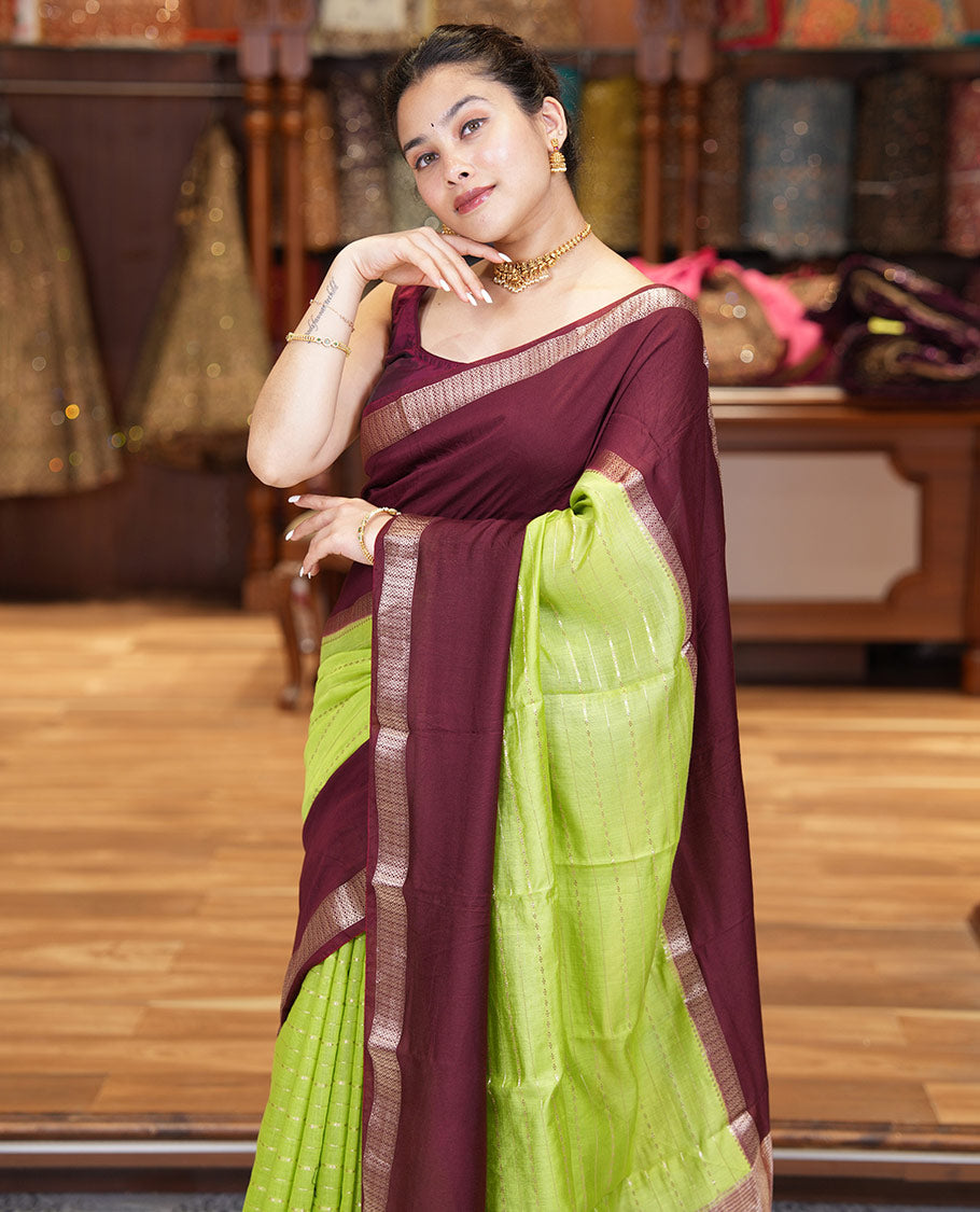Elaichi Green Assam Silk Saree, Embellished with Horizontal Zari Stripes All Over Its Body, Complemented by a Contrast Traditional Zari Design Rettai Pettu Border, Grand Zari Striped Pallu, and Paired with a Contrast Blouse