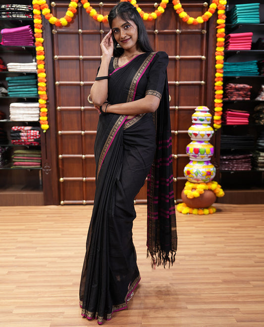 Black plain mercerised cotton saree, contrast temple traditional border, striped pallu, and a matching blouse