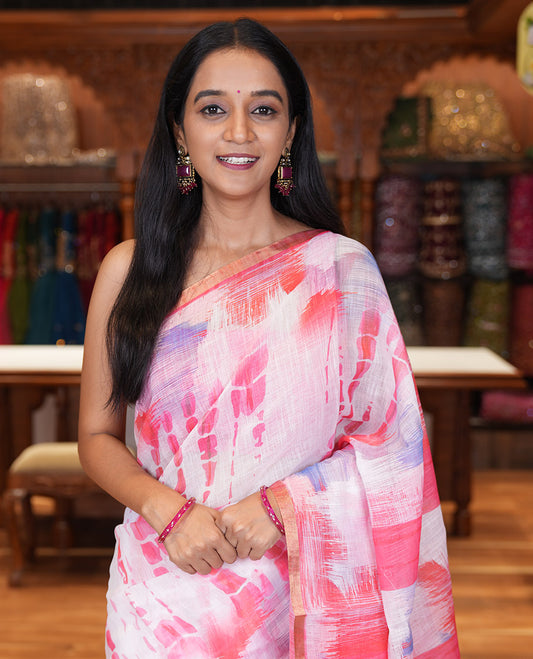 White-Pink Linen Cotton Saree, Decked Up with Shibori Print, a Piping Border, Shibori-Printed Pallu, and a Contrast Blouse