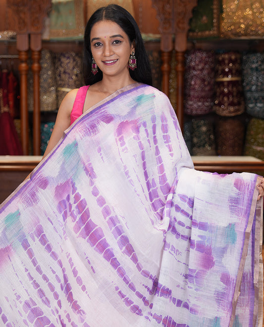 White-Violet Linen Cotton Saree, Decked Up with Shibori Print, a Piping Border, Shibori-Printed Pallu, and a Contrast Blouse