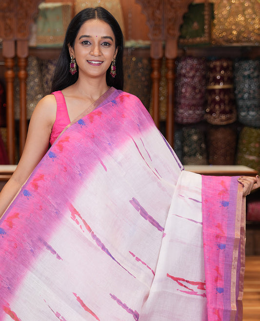 White-Magenta Linen Cotton Saree Features Watercolor Painting-style Shibori Print, Contrast Printed Border, Printed Pallu, and a Contrast Blouse