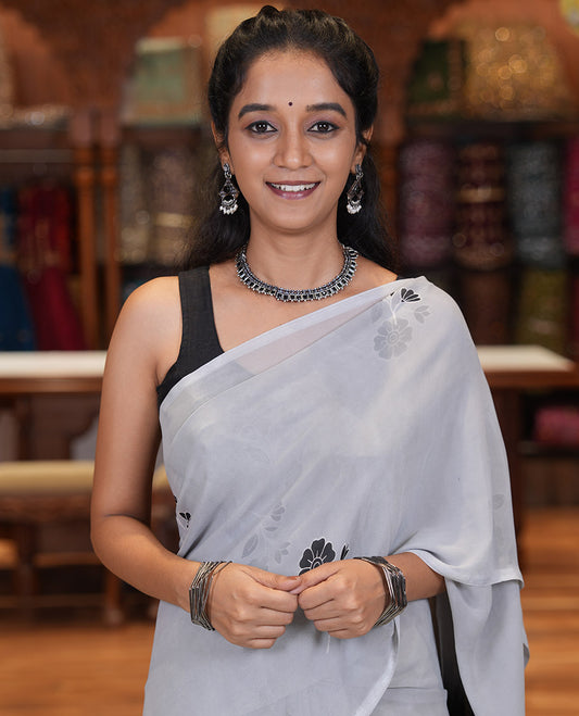 Borderless Grey-Black Georgette Saree, Adorned with Floral Motifs, Contrast Floral Printed Mirrorwork Pallu, and a Contrast Designer Blouse