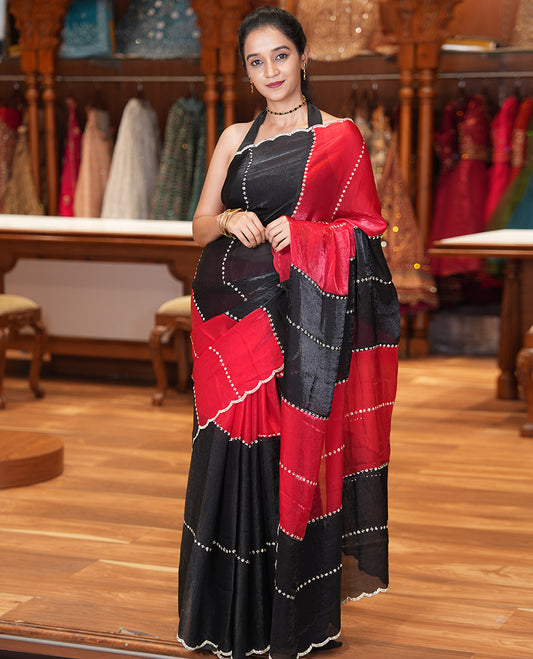 Red-Black Fendi Chiffon Saree, Gleamed Up with Swarovski Stonework, a Scallop Swarovski Stonework Border, a Matching Stonework Blouse