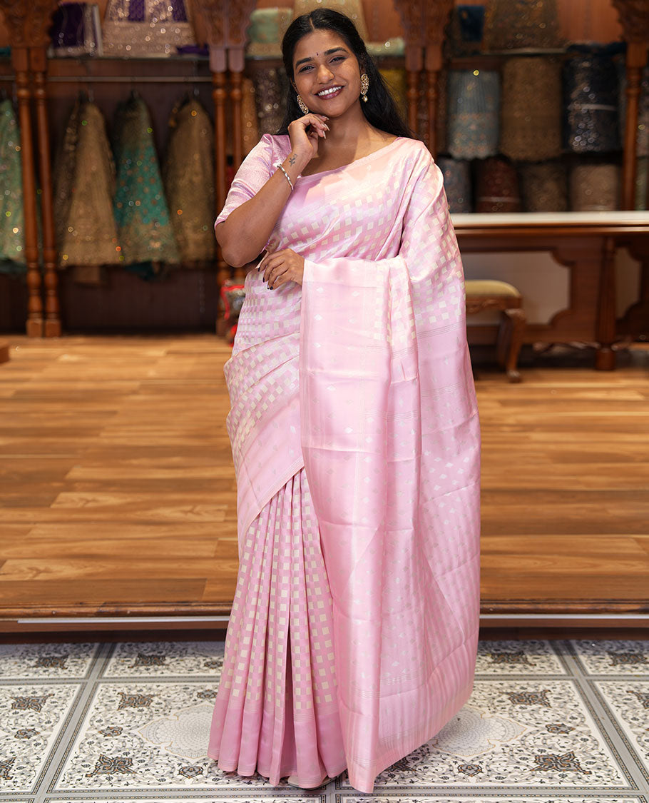 Pink Kanchi Silk Saree, Embellished with Checked Design on Its Body, Highlighted by a Self-Border of Diamond Patterns, Pallu Steeped with Buttas, and Paired with a Matching Blouse