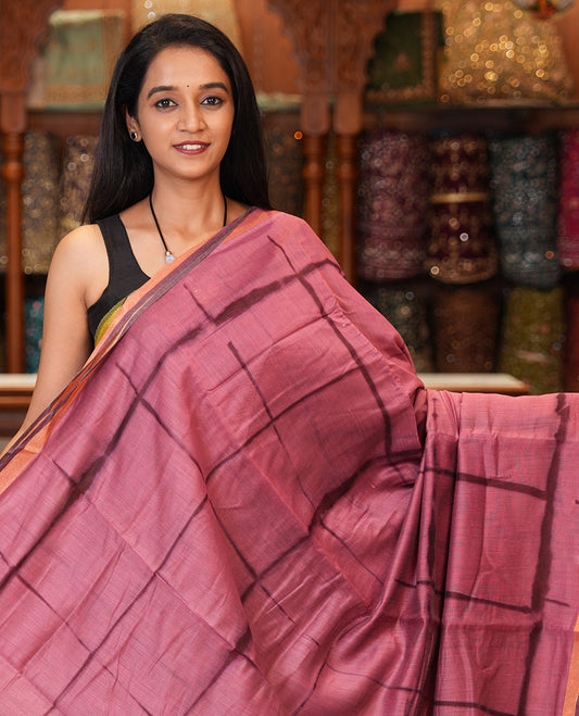Onion Pink Linen Cotton Saree, Adorned with Shibori Checks, a Subtle Piping Border, Geometric Pallu, and a Matching Blouse