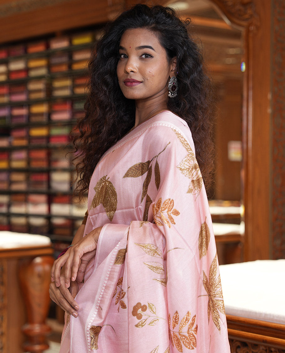 Light pink unique size and shaped leaf motifs printed fancy tussar saree, resham thread woven border, leaf motifs printed pallu, and a matching striped blouse