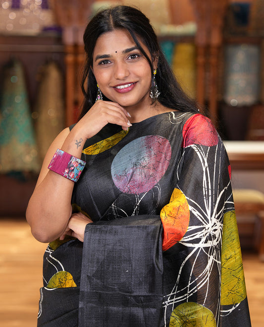 Borderless Black and Red Khadi Cotton Saree, Adorned with Big Circles Motifs, Floral Motifs, and Batik Print on Its Body, Self-Printed Pallu, and Paired with a Matching Printed Blouse