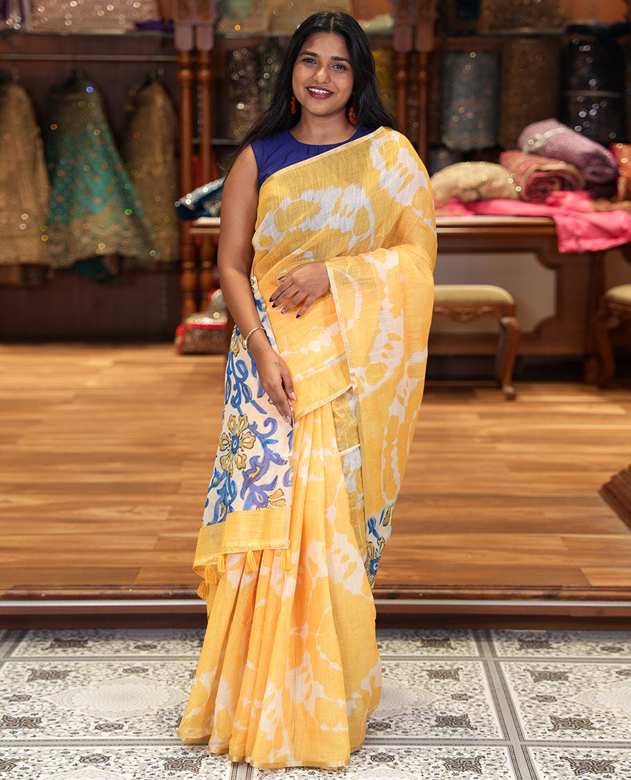 Borderless Yellow Linen Cotton Saree, Decked Up with Shibori Printed on Its Body, Complemented by Contrast Floral Printed Pallu, and Paired with a Contrast Floral Printed Blouse