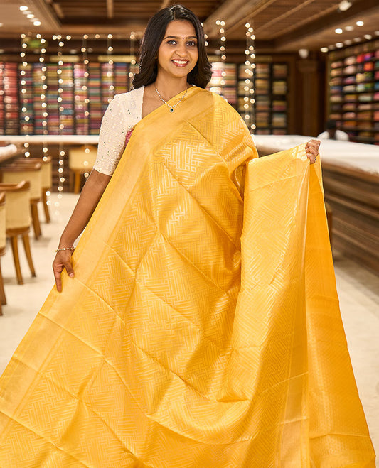 Yellow-color base rose-gold jacquard Kanchipuram silk saree, zari border & diamond buttas woven pallu