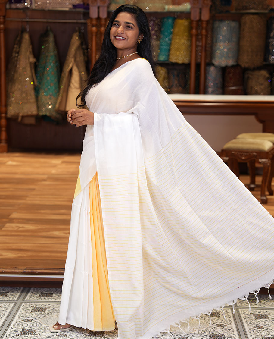 Borderless White and Pastel Yellow Plain Khadi Mul Cotton Saree, Self-Pallu Steeped with Stripes, and Paired with a Plain Blouse