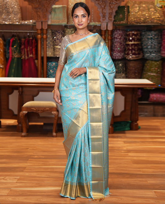 Sky Blue Budget Silk Saree, Enriched with Zari Buttas All Over Its Body, Highlighted by Traditional Zari Designs Woven Border, Grand Pallu, Paired with a Matching Blouse - Inspired by Trisha Blue Saree