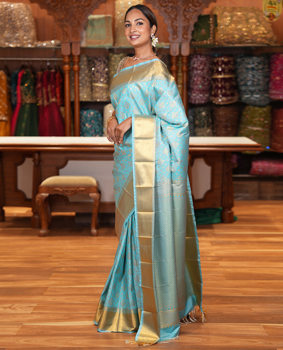 Sky Blue Budget Silk Saree, Enriched with Zari Buttas All Over Its Body, Highlighted by Traditional Zari Designs Woven Border, Grand Pallu, Paired with a Matching Blouse - Inspired by Trisha Blue Saree