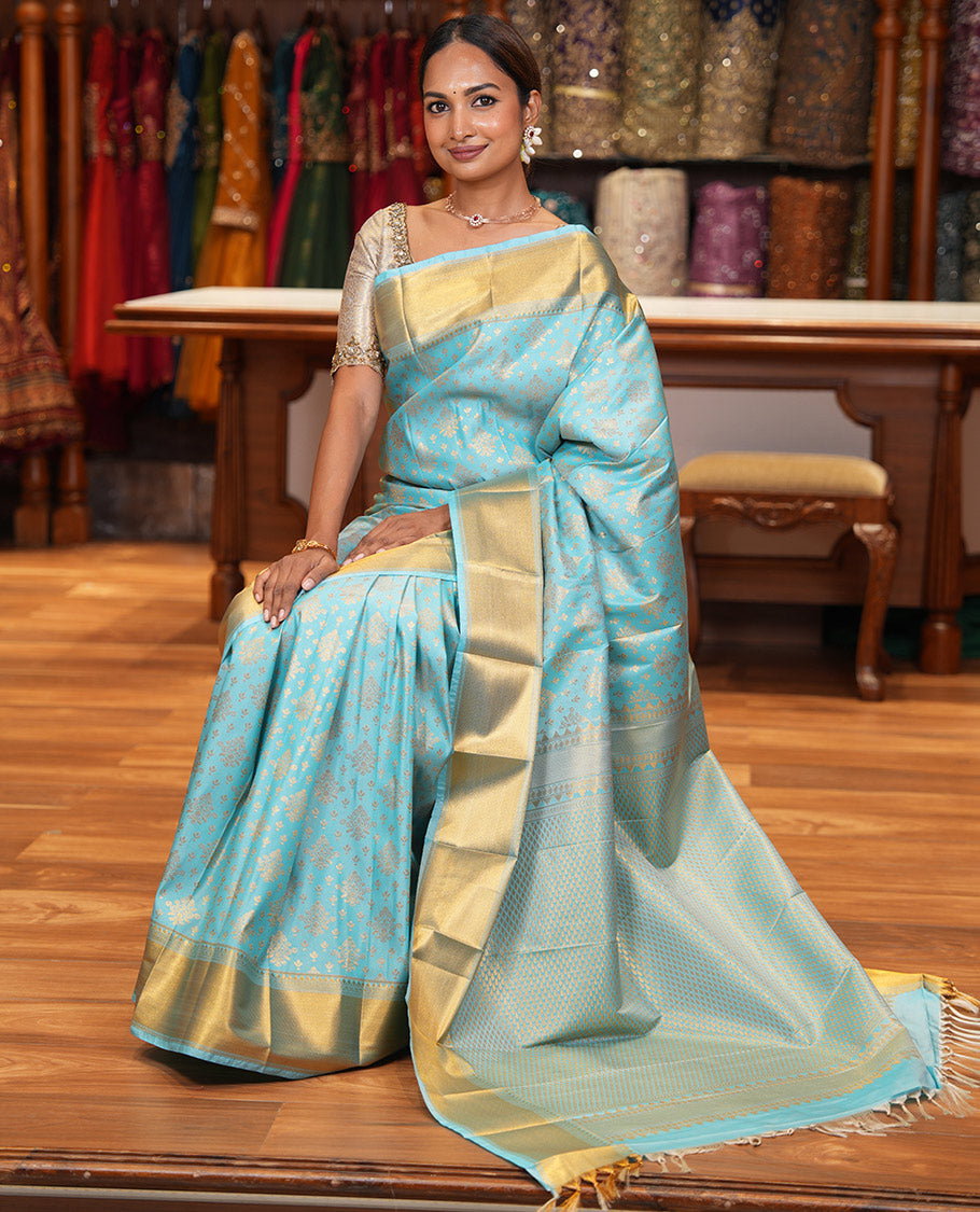 Sky Blue Budget Silk Saree, Enriched with Zari Buttas All Over Its Body, Highlighted by Traditional Zari Designs Woven Border, Grand Pallu, Paired with a Matching Blouse - Inspired by Trisha Blue Saree