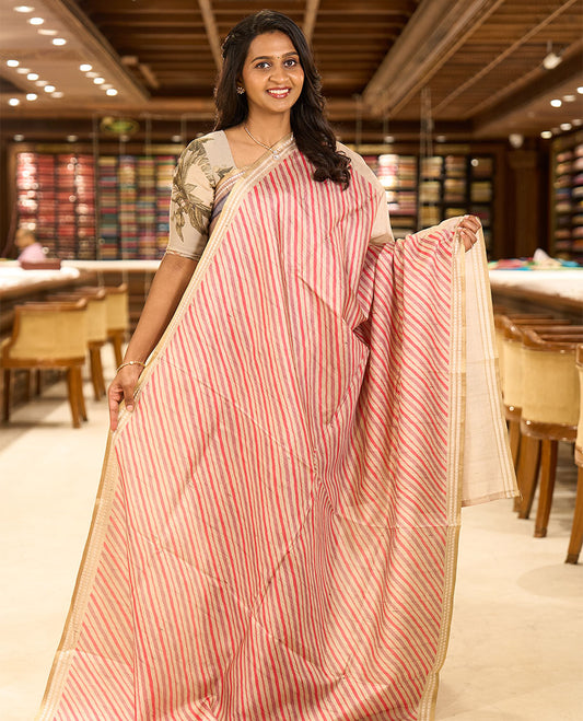 Pink lehariya-style striped semi-tussar saree, contrast resham thread triangle motifs border, diamond printed pallu & contrast printed blouse