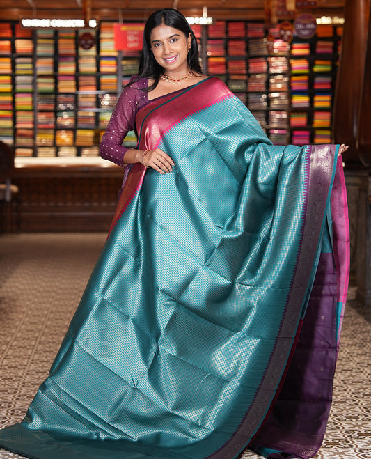 Peacock Green Zari Checked Litchi Saree with Contrast Ganga-Jamuna Border, Grand Pallu, and a Contrast Blouse