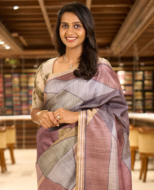 Grey abstract geometric printed semi-tussar saree, contrast thread triangle motifs border, striped pallu & contrast striped blouse