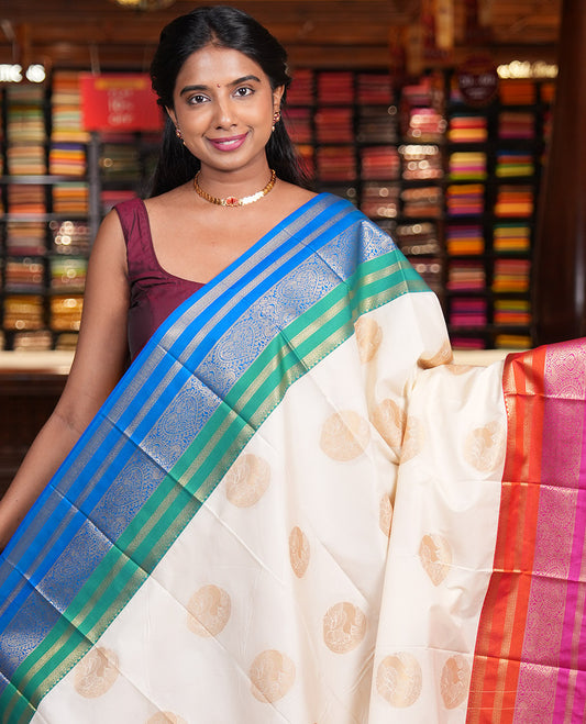Off-White Budget Silk Saree, Enthralled with Zari Buttas, Contrast Ganga-Jamuna Traditional Border, Grand Pallu, and a Contrast Blouse