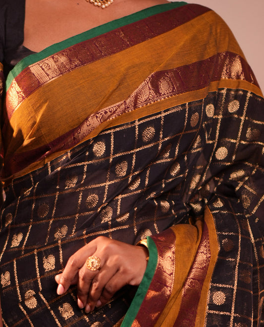 Black Chettinad Cotton Saree, Decorated with Mayil-Chakra Butta Enclosed Checks, a Contrast Rettai Pettu Border, Grand Pallu, a Matching Blouse