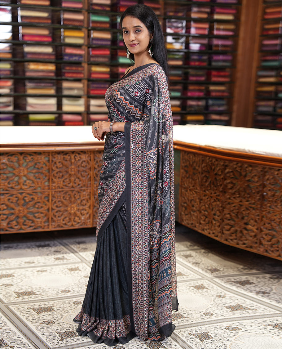 Grey geometric patterns batik style printed and mirror work masakali saree, printed border, geometric printed pallu, and a matching blouse