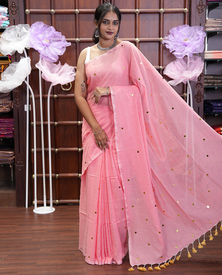 Borderless Peach Khadi Mul Cotton Saree, Gleamed Up with Sequins Work All Over Its Bodyt, and Pallu, and Paired with a Matching Blouse